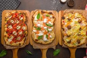 foto esempio differenza tra pinsa e pizza